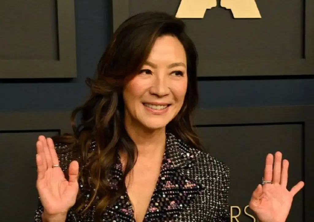 Michelle Yeoh in embellished Chanel suit at the 2023 Oscars Nominee Luncheon