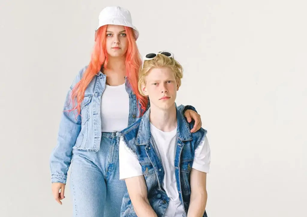 man and woman in denim jackets and jeans